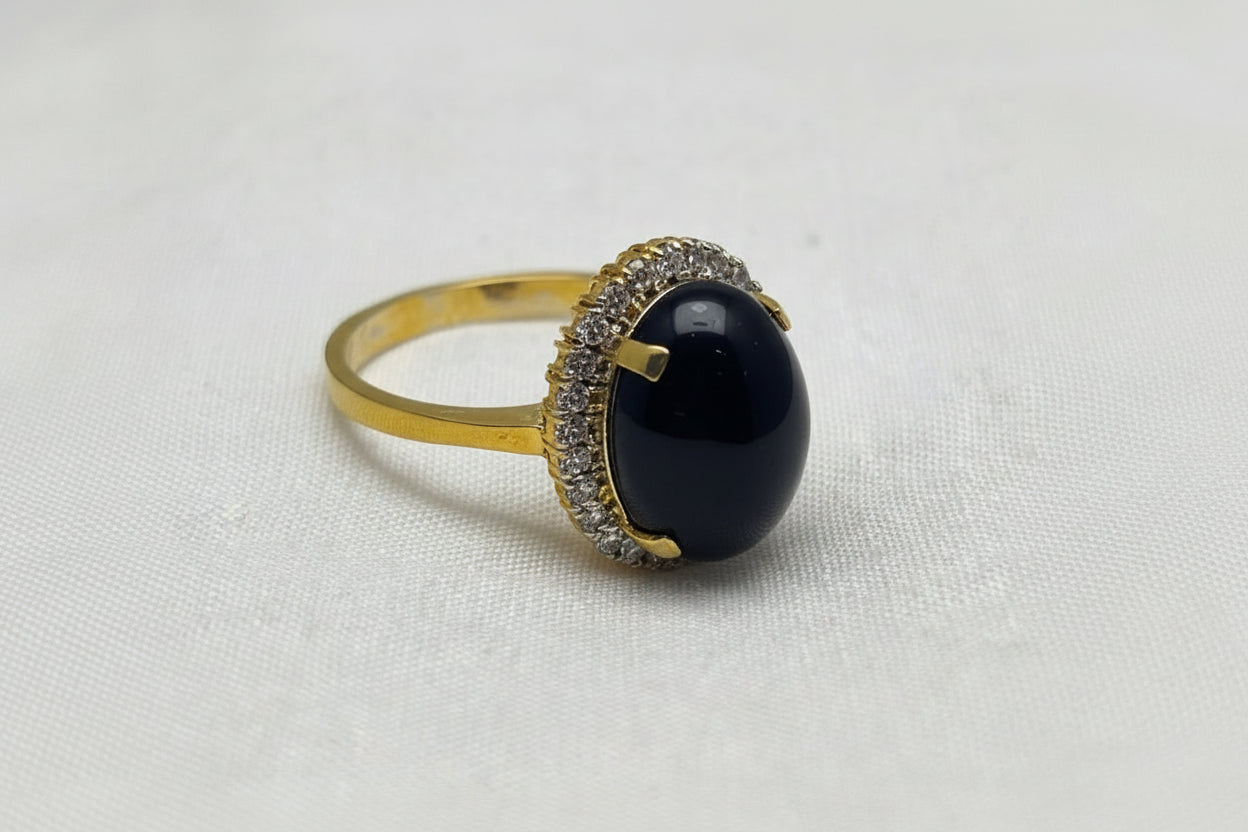 Gold plated black oval stone ring