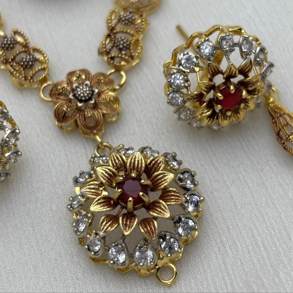Gold-Plated Floral Jewelry Set with Ruby Red Center & White Stone Accents