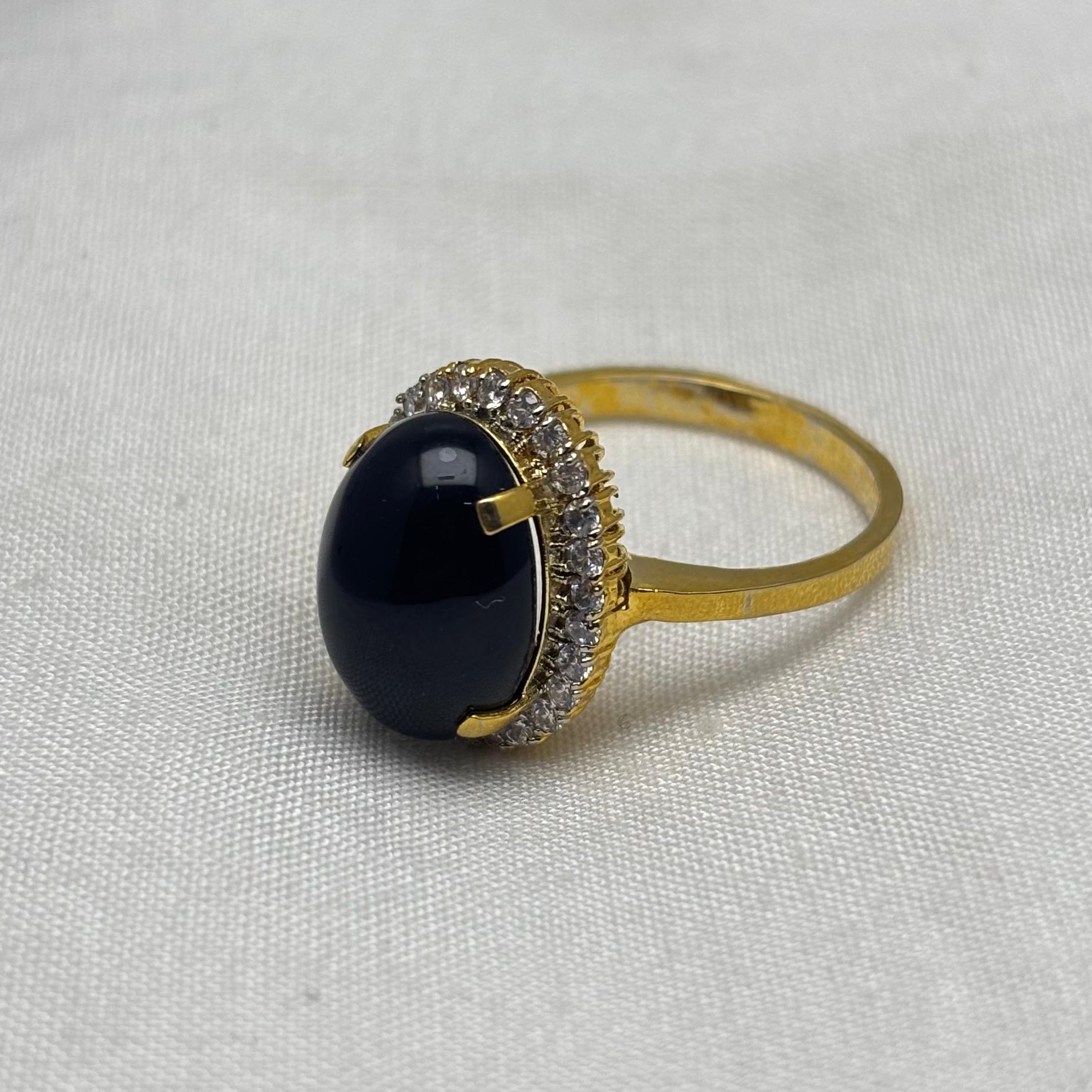 Gold plated  black oval stone ring