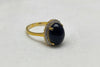Gold plated  black oval stone ring